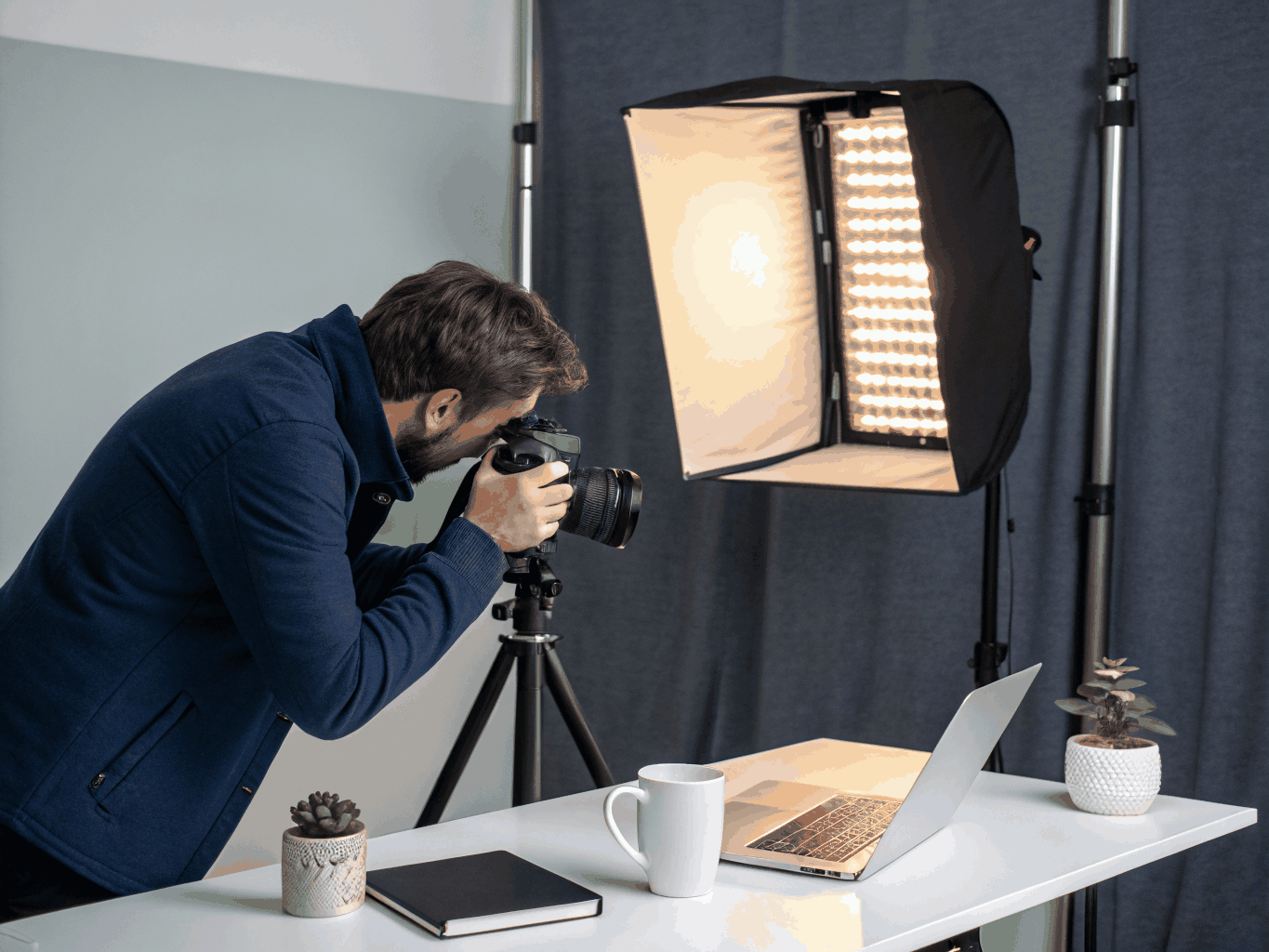 Photographer taking product photos in a studio setup